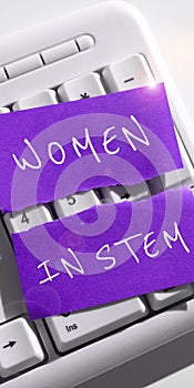 Writing displaying text Women In Stem. Business showcase Science Technology Engineering Mathematics Scientist Research