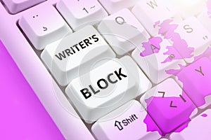 Writing displaying text Writer's Block. Word Written on Condition of being unable to think of what to write photo
