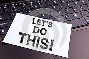 Writing Human Trafficking text made in the office close-up on laptop computer keyboard. Business concept for Encouragement Initiat photo