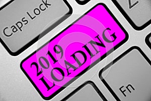 Writing note showing 2019 Loading. Business photo showcasing Advertising the upcoming year Forecasting the future event Keyboard p