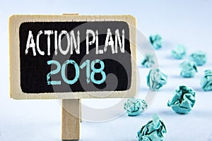 Writing note showing Action Plan 2018. Business photo showcasing Plans targets activities life goals improvement development writ