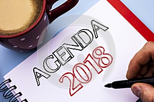 Writing note showing Agenda 2018. Business photo showcasing Strategy Planning Things Schedule Future Goals Organize written on No