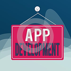 Writing note showing App Development. Business photo showcasing the act or process by which a mobile app is developed Memo