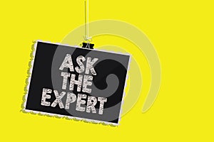 Writing note showing Ask The Expert. Business photo showcasing Looking for professional advice Request Help Support Hanging blackb