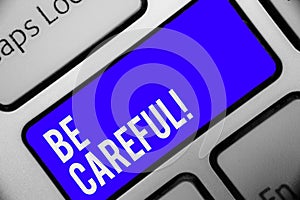 Writing note showing Be Careful. Business photo showcasing making sure of avoiding potential danger mishap or harm Keyboard blue k