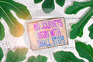 Writing note showing Big Journeys Begin With Small Steps. Business photo showcasing One step at a time to reach your