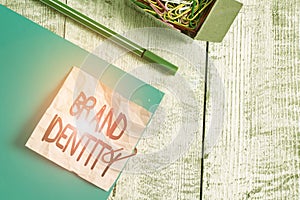 Writing note showing Brand Identity. Business photo showcasing visible elements of a brand that identify and distinguish Wrinkle