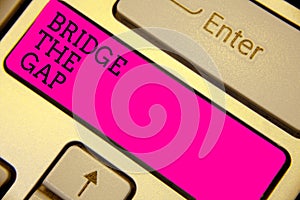 Writing note showing Bridge The Gap. Business photo showcasing Overcome the obstacles Challenge Courage Empowerment Keyboard pink