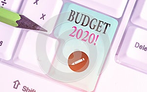 Writing note showing Budget 2020. Business photo showcasing estimate of income and expenditure for next or current year.