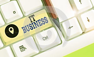 Writing note showing It Business. Business photo showcasing organization uses information technology to achieve goals.