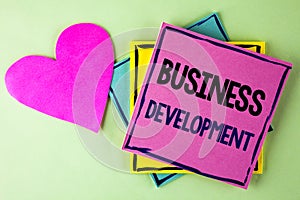 Writing note showing Business Development. Business photo showcasing Develop and Implement Organization Growth Opportunities writ