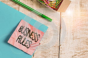 Writing note showing Business Rules. Business photo showcasing a specific directive that constrains or defines a business Wrinkle