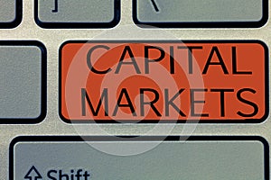 Writing note showing Capital Markets. Business photo showcasing Allow businesses to raise funds by providing market security