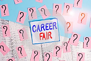 Writing note showing Career Fair. Business photo showcasing an event at which job seekers can meet possible employers Scribbled