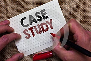 Writing note showing Case Study. Business photo showcasing A subject matter to be discussed and related to the topic Man's hand h