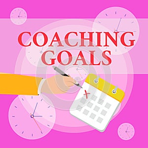 Writing note showing Coaching Goals. Business photo showcasing Empowers individuals Encourages them to take