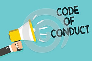 Writing note showing Code Of Conduct. Business photo showcasing Ethics rules moral codes ethical principles values respect Man hol