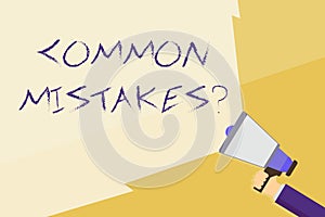 Writing note showing Common Mistakes question. Business photo showcasing repeat act or judgement misguided or wrong Hand