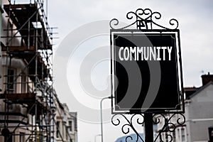 Writing note showing Community. Business photo showcasing Neighborhood Association State Affiliation Alliance Unity Group Vintage