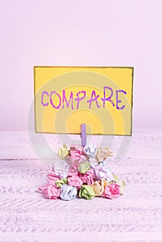 Writing note showing Compare. Business photo showcasing Estimate Measure Note the similarities dissimilarities between Reminder photo