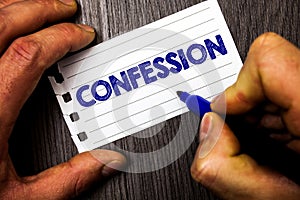 Writing note showing Confession. Business photo showcasing Admission Revelation Disclosure Divulgence Utterance Assertion Man hol photo