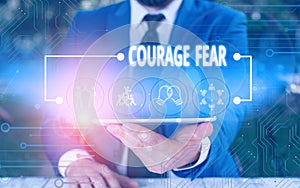 Writing note showing Courage Fear. Business photo showcasing quality of mind that enables a demonstrating to face