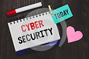 Writing note showing Cyber Security. Business photo showcasing Protect a computer system against unauthorized access Open notebook