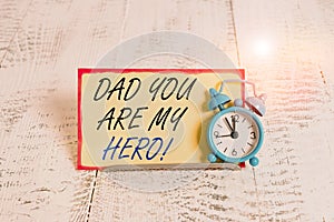 Writing note showing Dad You Are My Hero. Business photo showcasing Admiration for your father love feelings compliment