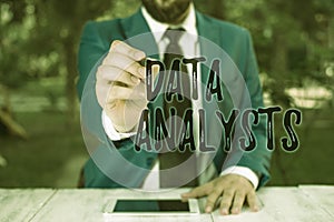 Writing note showing Data Analysts. Business photo showcasing Programmer Design and Create Report Identifies patterns
