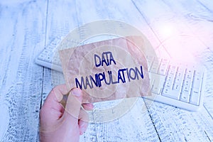 Writing note showing Data Manipulation. Business photo showcasing the process of changing data to make it easier to read