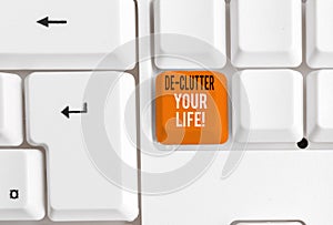 Writing note showing De Clutter Your Life. Business photo showcasing remove unnecessary items from untidy or overcrowded