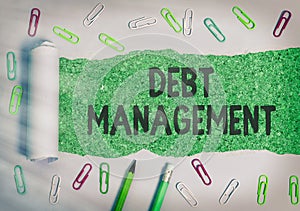 Writing note showing Debt Management. Business photo showcasing The formal agreement between a debtor and a creditor