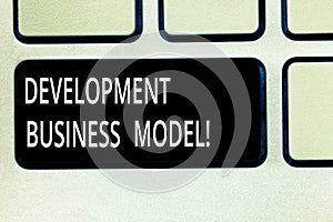 Writing note showing Development Business Model. Business photo showcasing rationale of how an organization created photo