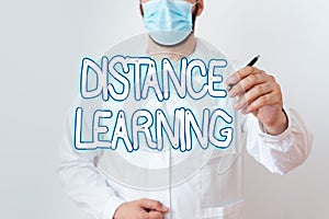 Writing note showing Distance Learning. Business photo showcasing educational lectures broadcasted over the Internet