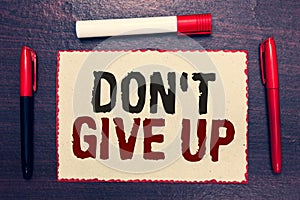 Writing note showing Don t not Give Up. Business photo showcasing Determined Persevering Continue to Believe in Yourself Open note