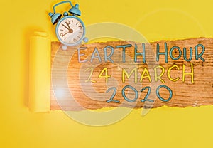 Writing note showing Earth Hour 24 March 2020. Business photo showcasing Celebrate Sustainability Save the Planet Lights