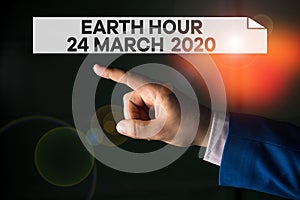 Writing note showing Earth Hour 24 March 2020. Business photo showcasing Celebrate Sustainability Save the Planet Lights