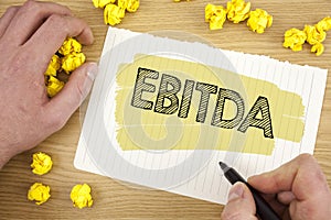 Writing note showing Ebitda. Business photo showcasing Earnings before tax is measured to evaluate company performance written on