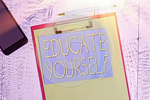 Writing note showing Educate Yourself. Business photo showcasing prepare oneself or someone in a particular area or subject