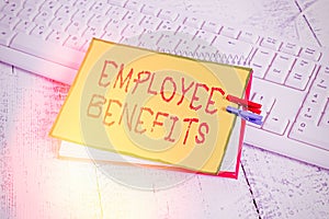 Writing note showing Employee Benefits. Business photo showcasing Indirect and noncash compensation paid to an employee notebook photo