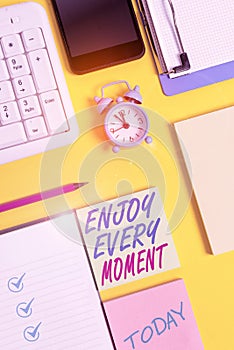Writing note showing Enjoy Every Moment. Business photo showcasing being pleased with your life Have fun Precious time