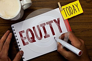 Writing note showing Equity. Business photo showcasing quality of being fair and impartial race free One hand Unity Man