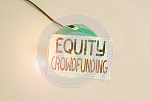 Writing note showing Equity Crowdfunding. Business photo showcasing raising capital used by startups and earlystage