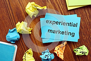 Writing note showing experiential marketing.