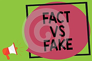 Writing note showing Fact Vs Fake. Business photo showcasing Rivalry or products or information originaly made or imitation Megaph photo