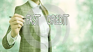 Writing note showing Fast Credit. Business photo showcasing Apply for a fast demonstratingal loan that lets you skip the hassles photo