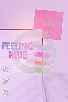 Writing note showing Feeling Blue. Business photo showcasing Feeling of desperation because of sadness or missing someone Hard