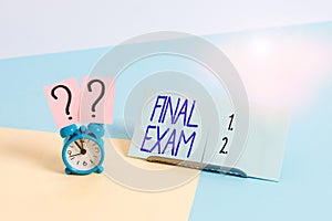 Writing note showing Final Exam. Business photo showcasing test given to student at the end of a course of study or