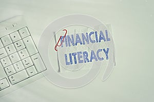 Writing note showing Financial Literacy. Business photo showcasing Understand and knowledgeable on how money works White pc
