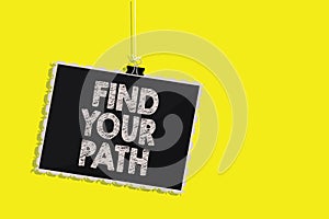 Writing note showing Find Your Path. Business photo showcasing Search for a way to success Motivation Inspiration Hanging blackboa